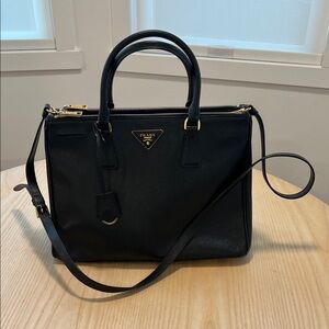 Prada Black Leather Satchel with Gold Accents